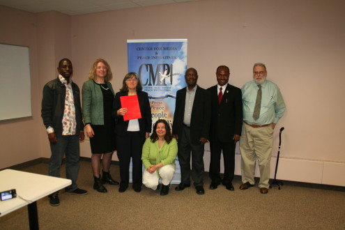 A group picture of officials of CMPI and participants in the conference